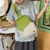 Mochila pequena portátil versátil para estudantes homens de grande capacidade em duas cores, bolsa de peito cruzada simples estilo japonês para mulheres