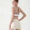 Ropa interior deportiva europea y americana para mujer, con tirantes cruzados en la espalda, para yoga, top ajustado a prueba de golpes y para fitness al aire libre.