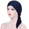 AliExpress nuevo gorro de punto de color liso con dos pompones de arco europeo y americano en stock