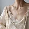 Collar Irregular Europeo y Americano con Velas Pintura a Fuego Lava Portavelas Retro Acero Inoxidable Chapado en Oro de 18K Xl657