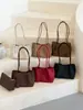 Bolsa feminina de grande capacidade, nova de 2026 estilo coreano de verão, bolsa de ombro de luxo leve de nicho para trabalho e deslocamento, bolsa de ombro