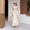 Elegante vestido de tirantes para mujer estilo resort costero de encaje resistente con chaqueta cárdigan protectora del sol, conjunto de dos piezas de moda, puro y seductor