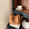 Bolsa de mão pequena retrô minimalista transfronteiriça, nova bolsa de ombro estilosa, bolsa de antebraço, bolsa feminina, bolsa tote de alta qualidade e chique