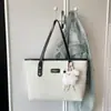 Bolso de mano de moda transfronterizo, nuevo bolso de hombro simple vintage para el día a día, bolso casual personalizado para viajes cortos para mujer