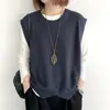 Chaleco Tejido Retro para Mujer 2026 Primavera y Otoño Nuevo Estilo Color Sólido Holgado Cuello Redondo Chaleco de Punto Asimétrico Ropa de Abrigo
