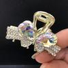 Clip de mariposa de lazo de diamante flash mediano, temperamento de alta gama, clip para el cabello de media coleta, clip de tiburón para la parte posterior de la cabeza, horquilla de diamantes de imitación