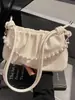 Bolso de Axila Plegado de Nicho Estilo Coreano para Mujer Moda Otoño 2025 Estilo Cadena de Perlas Bolso de Hombro Cruzado para Viajar