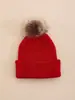 Chapéu redondo de tricô circular waffle de ponto duplo com bordas dobradas, cor sólida, moderno, versátil e quente, com pompom de pelo sintético de vison, para outono e inverno