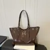 Elegante Diseño Sencillo de Nicho Otoño 2026 Nueva Moda Tendencia Gran Capacidad Texturizada Bolso Tote de Hombro Único y de Mano