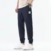 Directamente del fabricante: Pantalones Cortos Deportivos de Seda Helada de Nuevo Estilo Primavera, Holgados, Finos, de Secado Rápido, Estilo Jogger de Moda, Versátiles para Uso Casual