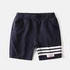 Pantalones cortos deportivos de verano para niños 2023 nuevos pantalones quintos con cinta de rayas para niños pantalones medios para bebés moda de una pieza