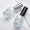 Venta al por mayor del fabricante Varios colores de Botellas de Perfume de 30 ml con Forma de Calavera, Botellas de Cáñamo, Botellas Pequeñas para Aceites Esenciales y Botellas de Vidrio para Manualidades