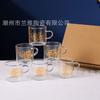 Lindo vaso pequeño de vidrio resistente a altas temperaturas de dibujos animados con asa, taza de té de alto valor de color, vidrio transparente de alto borosilicato al por mayor