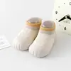 Calcetines de piso para bebé nuevos, color liso, suela suave, transpirables, a prueba de frío, antideslizantes, adecuados para niños y niñas, zapatos para antes de caminar, zapatos para caminar de bebé
