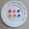 Accesorios mayoristas de pétalos brillantes y coloridos de flor de cerezo y flor de durazno para manualidades DIY, diademas infantiles, ropa, fundas de teléfono, zuecos y bolsos