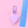 Llavero de corazón de melocotón nuevo color caramelo amor funda protectora aipods funda para auriculares colgante adornos para bolso