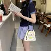 Bolso Pequeño de Lona Bordada de Nylon para Mujer Verano 2025 Nuevo Bolso Cruzado con Cierre de Cordón Bolso Simple Portátil para Teléfono Móvil