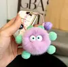 Bolso Colgante Bola de Carbón Pequeña de Piel de Conejo Decoración de Muñeca para Mochila Llavero de Coche de Juguete Animalito Lindo Esférico