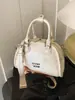 Bolso pequeño de alta gama transfronterizo para mujer, nueva versión coreana 2026, bolso tipo almohada simple, diseño de nicho, bolso de mano, bolso de hombro, bolso cruzado