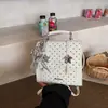 Bolso Pequeño de Moda Casual para Mujer Bolso 2026 Verano Nuevo Estilo Coreano Diseño de Nicho Mochila Estampada para Mujer