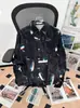 Camisa Retro de Manga Longa Estilo Japonês para Homens e Mulheres Estilo de Hong Kong Floral Fashionable Estilo Coreano Senso de Design de Nicho Camisa Solta com Gravata para o Verão
