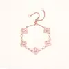 Pulsera Hollow con Circonita Microincrustada de Trébol de la Suerte Tendencia en Tiktok, Lujo Ligero, Sensación de Alta Gama, Diseño de Nicho, Accesorio de Mano Exquisito y Versátil