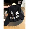 Otoño 2026 Nuevo Estilo Cardigan de Punto Jacquard Caballo Pequeño para Mujer Casual Estilo Perezoso Suéter Abrigo Cuello Redondo Moderno