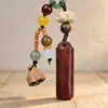 Colgante Llavero Cuerno de Rinoceronte Palo de Rosa Cadena para Bolso de Teléfono Móvil Hombres y Mujeres Colgante de Productos de Madera Creativos Joyería