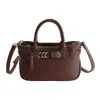 Bolso Pequeño Cuadrado Minimalista Elegante de Diseño de Nicho para Mujer Modelo Nuevo 2026 Bolso de Mano de Hombro Cruzado de Alta Gama para Viajes Diarios
