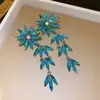Pendientes de Plata Europeos y Americanos Transfronterizos con Incrustaciones de Diamantes Flor Redonda con Borla Exagerados Únicos Pendientes Moda con Sentido del Diseño Adornos para Orejas para Mujeres