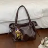 Bolsa de Ombro Único Cor Sólida Retrô Nova Outono 2026 Para o Trabalho Moda Relaxada Alta Aparência Personalidade Tendência Bolsa de Axila