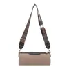 Nova Bolsa Transversal de Tecido de Nicho Outono 2025 Bolsa Feminina Casual Casual de Axila Fashionable Cilindro Pequeno de Aparência Sofisticada