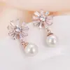 Brincos de Pérola Europeus e Coreanos de Alta Qualidade Novos Brincos Pendentes de Girassol com Pérola Design de Cobre Pedra Brilhante Brincos de Moda Femininos