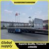 Fabricante de Origen Produce y Fabrica Suministro Transfronterizo de Semirremolques Plataforma con 12 Candados para Transportar Remolques de Contenedores a África