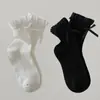 Calcetines para niños para otoño e invierno con bordes rizados y lazos, adecuados para niñas y bebés, estilo Lolita, calcetines de media pantorrilla sin presión