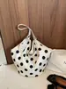 Bolso de axila de nicho de alta gama para mujer, bolso tipo cubo con estampado de lunares nuevo 2026, bolso de hombro de gran capacidad