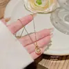 Delicado collar de calabaza estilo coreano para mujer, con detalles de diamantes, un diseño lujoso y sofisticado, un estilo único y discreto, y un versátil accesorio de cadena para la clavícula.