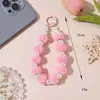 Colgante de cadena para teléfono de bola de felpa estilo coreano para otoño e invierno, colgante de bolsa de bola de pelo de perla de nicho, cadena colgante para llavero de funda de teléfono