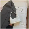 Bolso de Mano Yuezi de Nicho Bolso Dumpling para Mujer Nuevo Primavera 2026 Bolso de Hombro Cruzado Elegante y Único