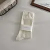 Calcetines de mujer sin costuras para primavera y otoño, calcetines blancos postparto de caña suelta, calcetines holgados de color liso estilo japonés, calcetines largos minimalistas