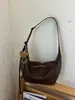 Bolso de mujer de gran capacidad, modelo nuevo 2026, textura de alta calidad, nicho, versátil para primavera y verano, bolso de hombro cruzado, bolso tipo dumpling de cuero suave