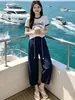 Conjunto Esportivo Casual Estilo Europeu para Mulheres 2026 Nova Moda de Verão Chique Redutor de Idade Calça Cropped Solta Conjunto de Duas Peças Tendência