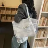 Bolsa Tote Versátil de Alta Qualidade Transfronteiriça para Mulheres 2026 Nova Bolsa de Ombro de Grande Capacidade Bolsa de Ombro Retrô Tendência