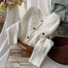 Nuevo cárdigan de punto trenzado para otoño e invierno, prenda de punto versátil holgada de manga larga, suéter elegante y suave para mujer
