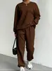Conjunto de Duas Peças Europeu e Americano Transfronteiriço Primavera e Outono 2025 Novo Top Feminino de Tricô Torcido com Mangas Longas e Gola Redonda e Leggings