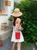 Exquisita bolsa para teléfono móvil de mujer, nuevo modelo 2026 mini bolsa cruzada, bolsa tejida hueca, bolsa cruzada ligera y versátil para el verano