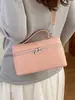Bolsa Transversal de Ombro Único Nova Verão 2026 Moda Casual Personalidade Bolsa de Mão Feminina Elegante Tendência Simples Pequena Quadrada