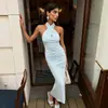 Conjunto de principios de otoño estilo europeo y americano: Diseño de cuello cruzado halter, vestido de hombros descubiertos, sexy y seductor, entallado en la cintura, adelgazante, vestido largo sin espalda