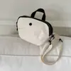 2025 Nueva Bolsa Pequeña de Lona Bolso de Hombro Bolso Cruzado de Nicho Bolsa para Teléfono Móvil Bolso Cuadrado Pequeño de Moda Casual