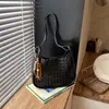 Moderna Bolso Cubo Grande Nuevo para Mujer 2026 Estilo Coreano Hueco Bolso de Hombro Único Versátil Bolso Cruzado para el Viaje Diario